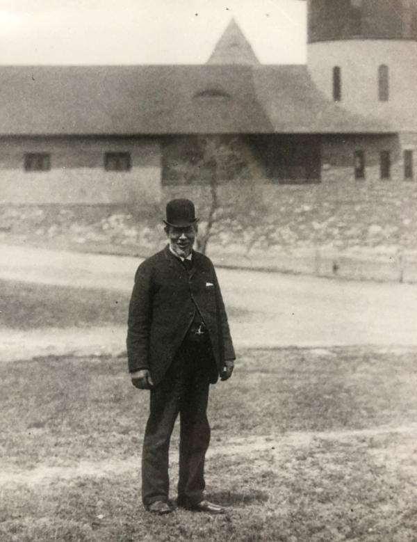 Arthur Taylor, Shelburne Farms General Manager, taken circa 1891, stands outside Farm Barn